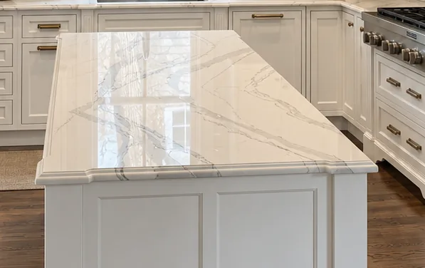 Marble island top and the cabinetry running behind it