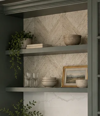 Open shelving in a built-in cabinet against a patterned stone back panel