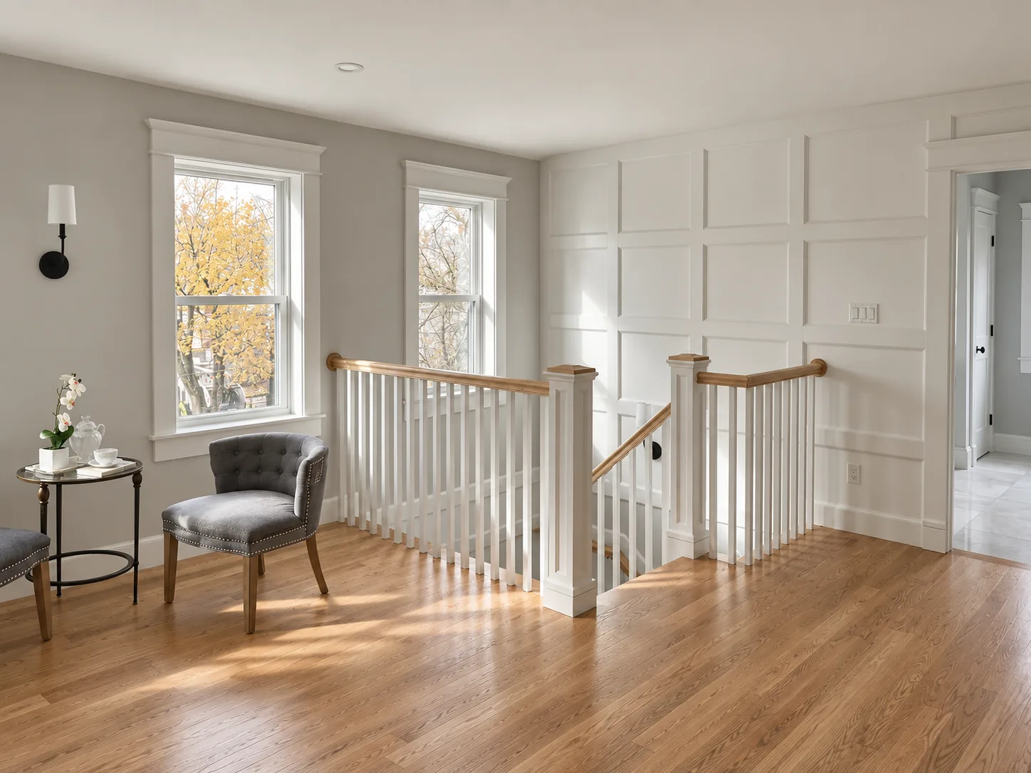 Upstairs landing with fitted wall panels around the stair opening